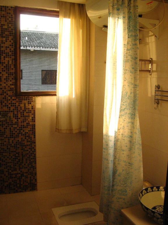 Bajie Youth Hostel Zhangjiajie Oda fotoğraf